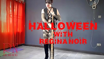 HALLOWEEN 2021 Witch in a black sexy suit. Black Playboy Bunny. Regina Noir 2