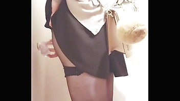 Girl pleasure herself with heels and dildo