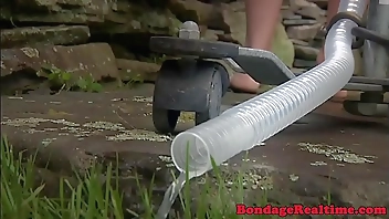 BDSM sub dominated with enema and bondage