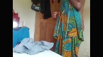 Amateur dressing up in front of cam