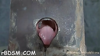 Clamped up sweetheart gets a hook in her anal with toy t.