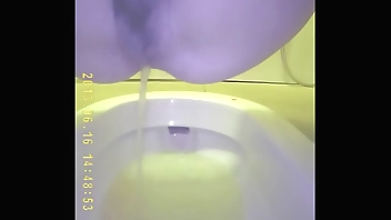 Asian teen pee in toilet 2