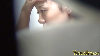 Cute asian seen rubbing