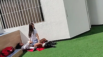 Young schoolboys have sex on the school terrace and are caught on a security camera.