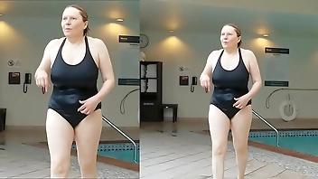 Sexy Grandma is Sexy at 66 in a black swimsuit