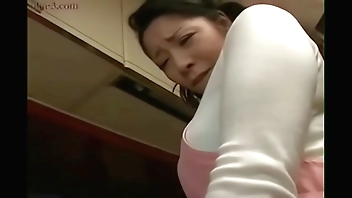 Japanese Wife and Young Boy in Kitchen Fun