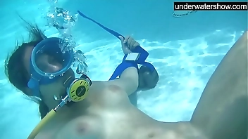 Candy being licked underwater