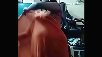 Swathi naidu sexy and romantic seducing in orange saree