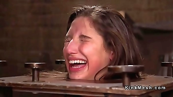 Slave in bondage props gagged big cock