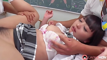 Japanese Mira Hasegawa had a threesome in the classroom uncensored.