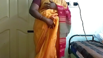 desi  indian horny tamil telugu kannada malayalam hindi cheating wife vanitha wearing orange colour saree  showing big boobs and shaved pussy press hard boobs press nip rubbing pussy masturbation
