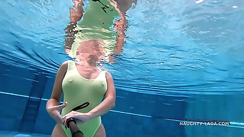 My transparent when wet one piece swimwear in public pool