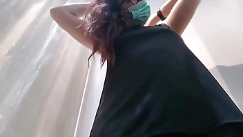 Your goes to a clothing store and puts her panties inside her pussy while she tries on some jeans