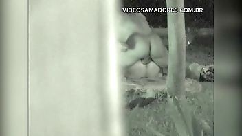 During meeting of friends, couple discreetly moves away to fuck, but is discovered