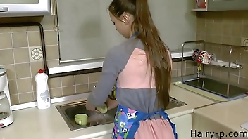 young wife in kitchen