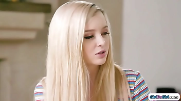 Stepmom shows stepteen how to use a toy