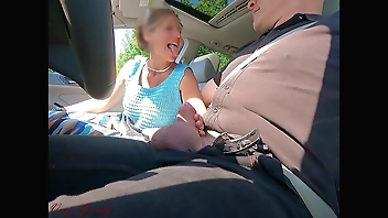 While driving my neighbor La Gourmande wanks my cock for a long time before sucking me while I drive! when I finally stop she greedily swallows all my cum without losing a drop