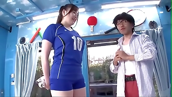 Makoto Takeda Tall Muscular Athletic Asian Woman Lifts and Blows a Little Man